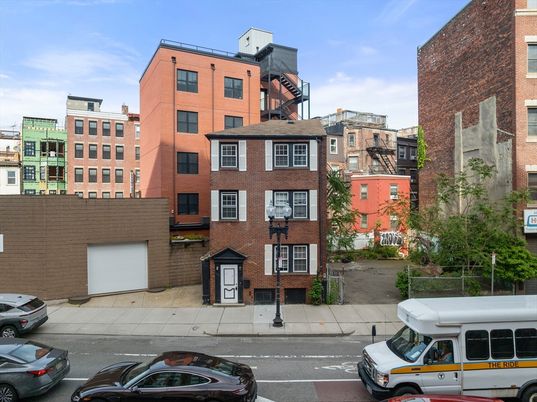 Exterior, Facade, Brick Facade, Condo Building