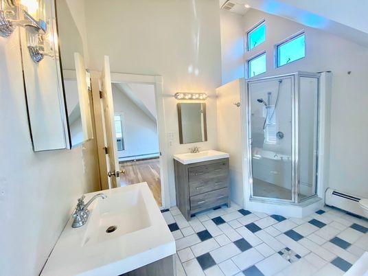Bathroom, Dual Sink Vanities, Glass Shower, Interior, Wood Texture Flooring
