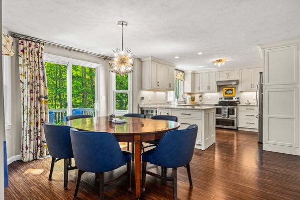 Dining room, Interior, Kitchen, Pendant Lights, Recessed Lighting, Stainless Steel Appliances, Wood Texture Flooring