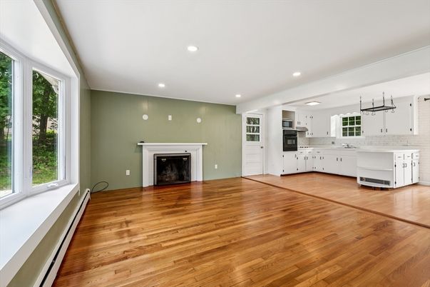 Empty room, Fireplace, Interior, Kitchen, Recessed Lighting, Wood Texture Flooring