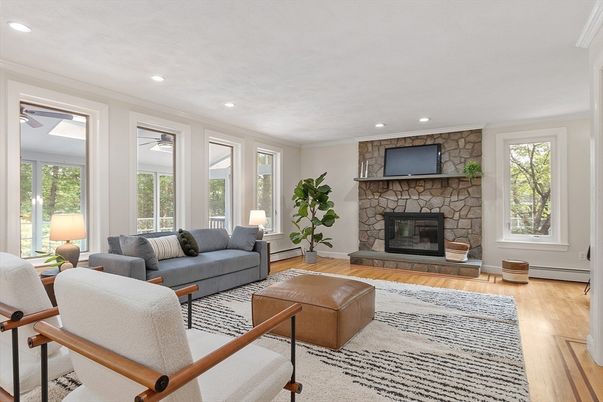 Fireplace, Interior, Living room, Recessed Lighting, Stone Walls, Wood Texture Flooring