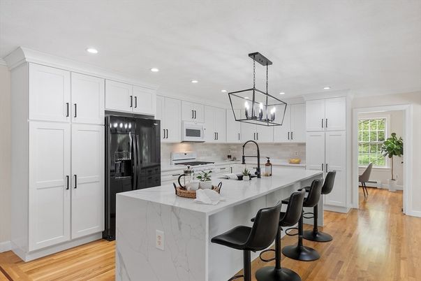 Interior, Kitchen, Marble Walls, Pendant Lights, Recessed Lighting, Stainless Steel Appliances, Wood Texture Flooring