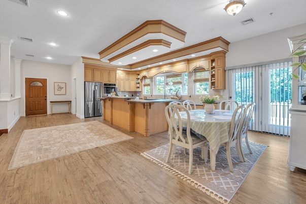 Dining room, Interior, Kitchen, Recessed Lighting, Stainless Steel Appliances, Wood Texture Flooring