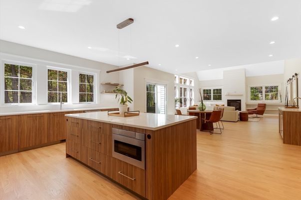 Dining room, Fireplace, Interior, Kitchen, Living room, Pendant Lights, Recessed Lighting, Stainless Steel Appliances, Wood Texture Flooring