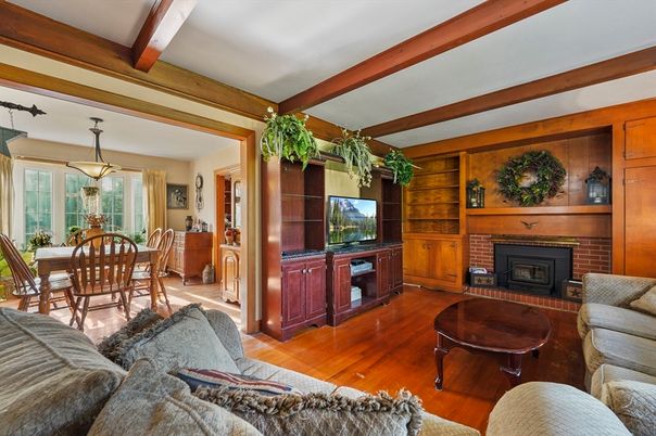 Dining room, Fireplace, Interior, Living room, Pendant Lights, Wooden Beams, Wood Texture Flooring