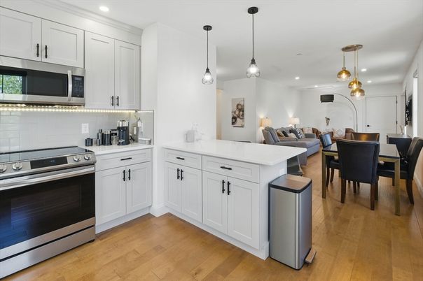 Dining room, Interior, Kitchen, Living room, Pendant Lights, Recessed Lighting, Stainless Steel Appliances, Wood Texture Flooring