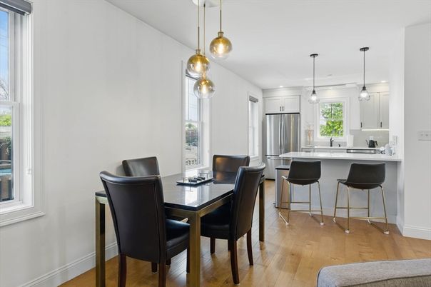 Dining room, Interior, Kitchen, Pendant Lights, Recessed Lighting, Stainless Steel Appliances, Wood Texture Flooring