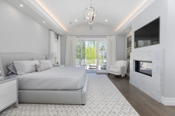 Bedroom, Fireplace, Interior, Pendant Lights, Recessed Lighting, Wood Texture Flooring