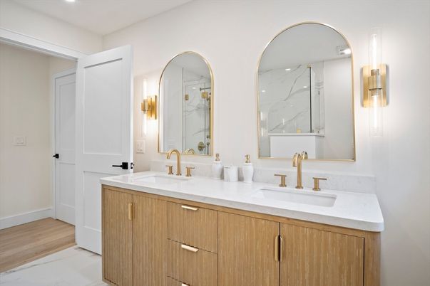 Bathroom, Dual Sink Vanities, Interior, Marble Walls, Wood Texture Flooring