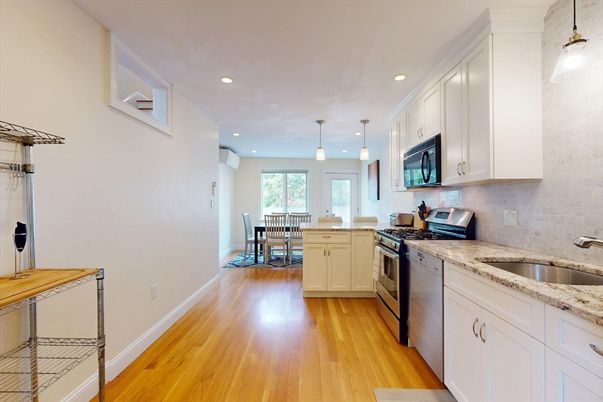 Dining room, Interior, Kitchen, Pendant Lights, Recessed Lighting, Stainless Steel Appliances, Wood Texture Flooring