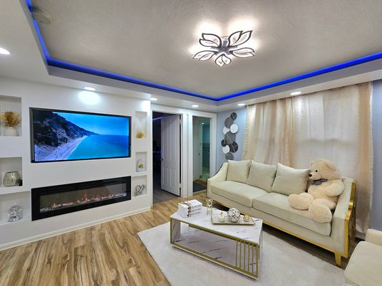 Fireplace, Interior, Living room, Recessed Lighting, Wood Texture Flooring