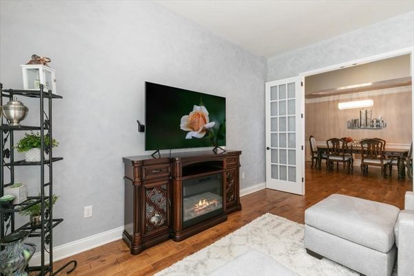 Chandelier, Dining room, Fireplace, Interior, Wood Texture Flooring