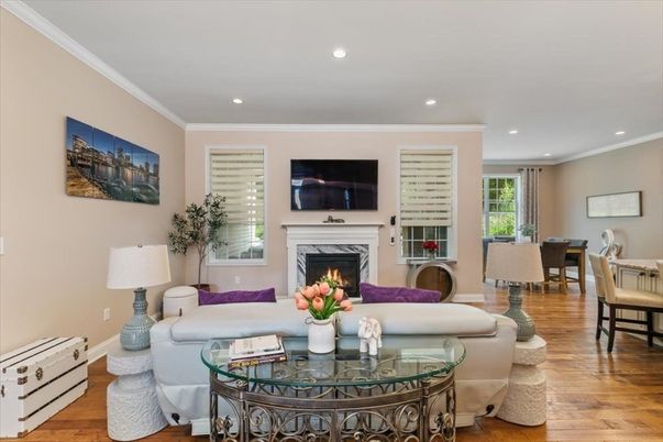 Dining room, Fireplace, Interior, Living room, Recessed Lighting, Wood Texture Flooring