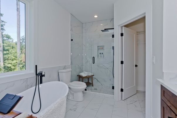 Bathroom, Free Standing Baths, Glass Shower, Interior, Marble, Marble Walls, Recessed Lighting