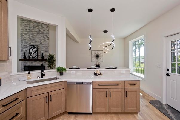 Fireplace, Interior, Kitchen, Pendant Lights, Stainless Steel Appliances, Stone Walls, Wood Texture Flooring