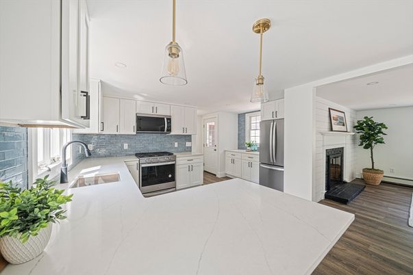 Fireplace, Interior, Kitchen, Pendant Lights, Recessed Lighting, Stainless Steel Appliances, Wood Texture Flooring