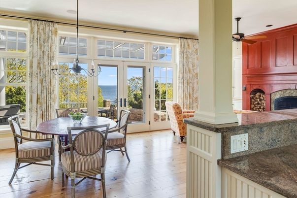 Dining room, Fireplace, Interior, Pendant Lights, Water, Wood Texture Flooring