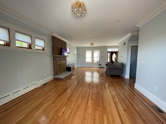 Empty room, Fireplace, Interior, Recessed Lighting, Stone Walls, Wood Texture Flooring