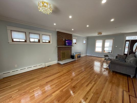 Empty room, Fireplace, Interior, Recessed Lighting, Stone Walls, Wood Texture Flooring