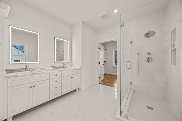 Bathroom, Dual Sink Vanities, Glass Shower, Interior, Marble, Recessed Lighting, Wood Texture Flooring