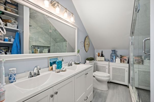 Bathroom, Dual Sink Vanities, Glass Shower, Interior, Wood Texture Flooring