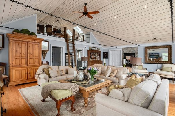 Fireplace, Interior, Living room, Recessed Lighting, Stone Walls, Wood Texture Flooring