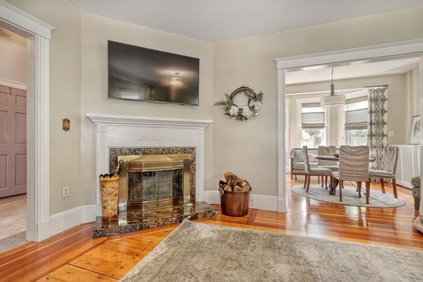 Dining room, Fireplace, Interior, Pendant Lights, Wood Texture Flooring