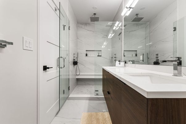 Bathroom, Dual Sink Vanities, Glass Shower, Interior, Marble, Marble Walls