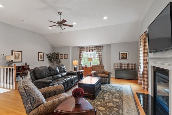 Dining room, Fireplace, Interior, Living room, Recessed Lighting, Wood Texture Flooring