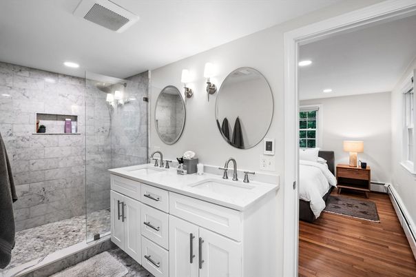 Bathroom, Bedroom, Dual Sink Vanities, Glass Shower, Interior, Marble Walls, Recessed Lighting, Wood Texture Flooring