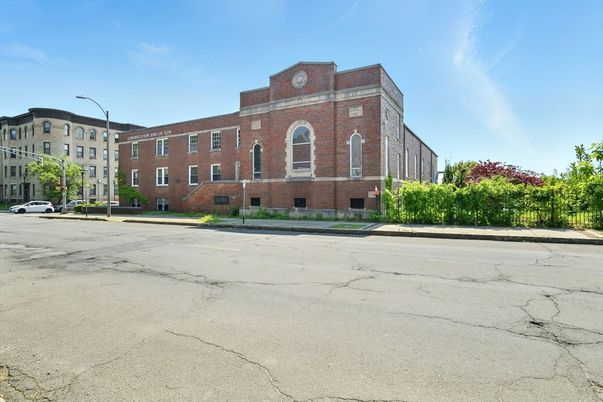 Exterior, Facade, Brick Facade, Condo Building
