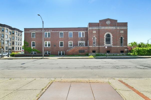 Exterior, Facade, Brick Facade, Condo Building
