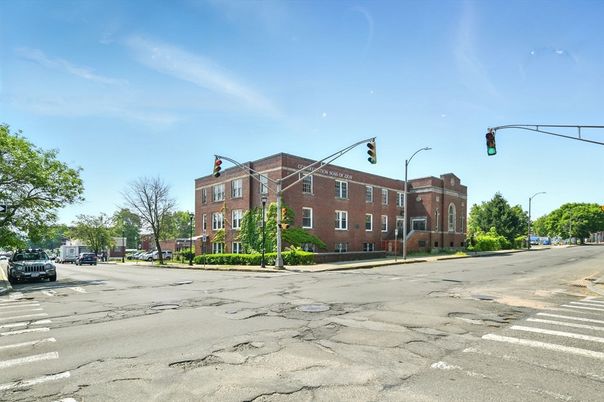 Exterior, Facade, Brick Facade, Condo Building