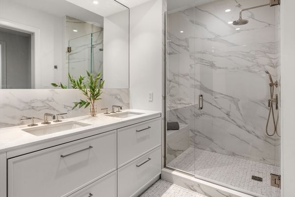 Bathroom, Dual Sink Vanities, Glass Shower, Interior, Marble Walls, Recessed Lighting