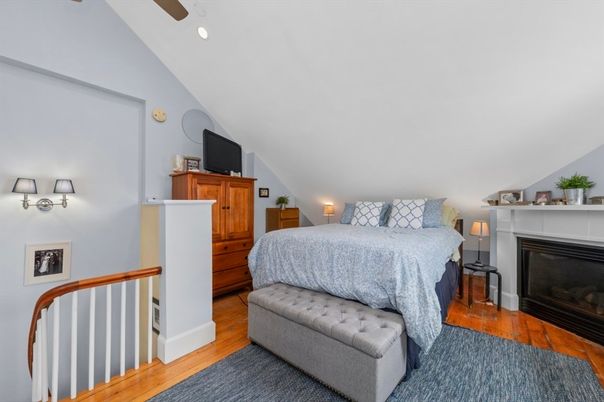 Bedroom, Fireplace, Interior, Recessed Lighting, Wood Texture Flooring