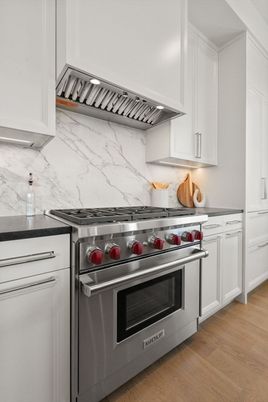 Interior, Kitchen, Marble Walls, Stainless Steel Appliances, Wood Texture Flooring