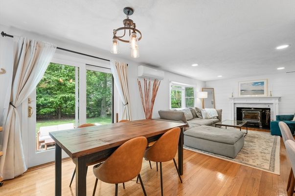 Dining room, Fireplace, Interior, Living room, Pendant Lights, Recessed Lighting, Wood Texture Flooring
