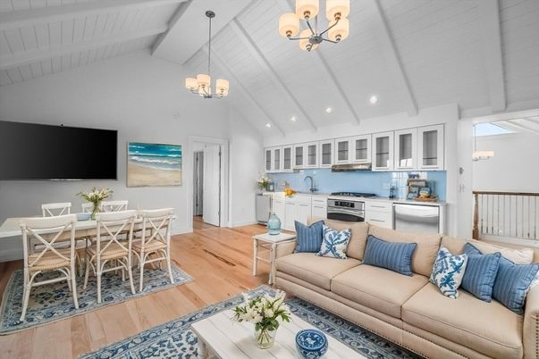 Chandelier, Dining room, Interior, Kitchen, Living room, Pendant Lights, Recessed Lighting, Stainless Steel Appliances, Wood Texture Flooring