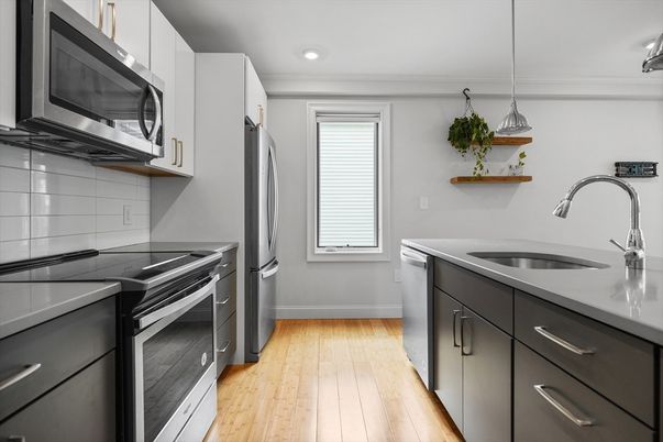 Interior, Kitchen, Pendant Lights, Recessed Lighting, Stainless Steel Appliances, Wood Texture Flooring