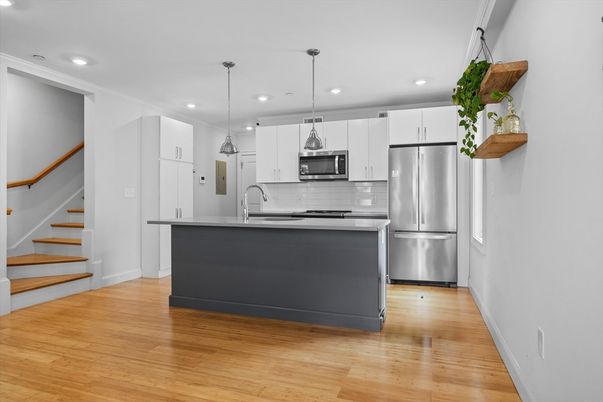 Interior, Kitchen, Pendant Lights, Recessed Lighting, Stainless Steel Appliances, Wood Texture Flooring