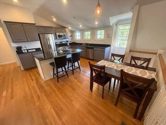 Dining room, Interior, Kitchen, Pendant Lights, Recessed Lighting, Stainless Steel Appliances, Wood Texture Flooring