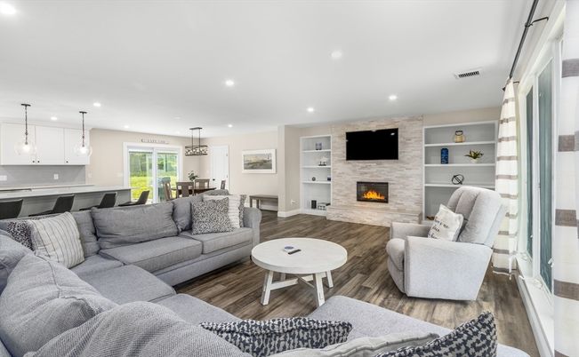 Dining room, Fireplace, Interior, Living room, Pendant Lights, Recessed Lighting, Stone Walls, Wood Texture Flooring