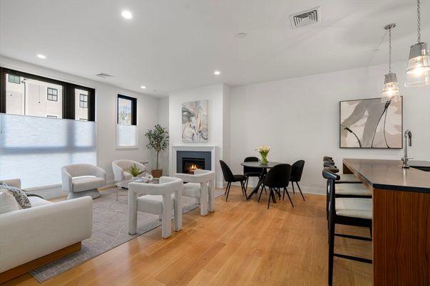 Dining room, Fireplace, Interior, Living room, Pendant Lights, Recessed Lighting, Wood Texture Flooring