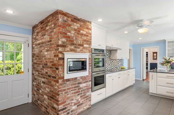 Interior, Kitchen, Recessed Lighting, Stainless Steel Appliances, Stone Walls