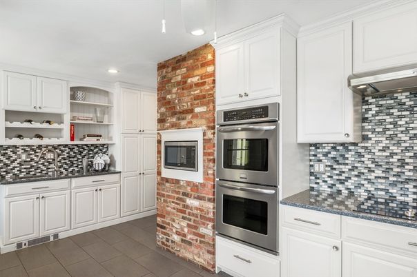 Interior, Kitchen, Recessed Lighting, Stainless Steel Appliances, Stone Walls