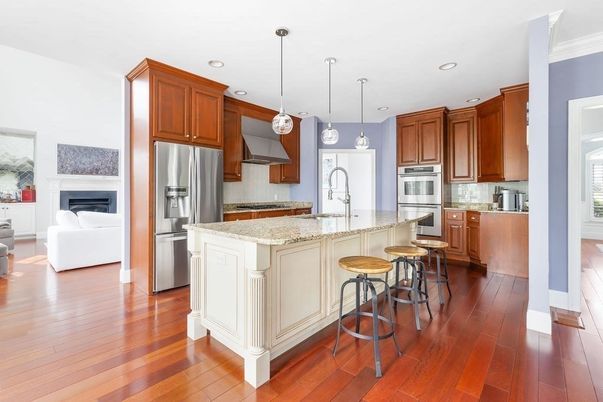 Fireplace, Interior, Kitchen, Pendant Lights, Recessed Lighting, Stainless Steel Appliances, Wood Texture Flooring