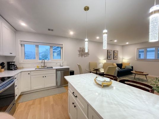 Dining room, Interior, Kitchen, Living room, Pendant Lights, Recessed Lighting, Stainless Steel Appliances, Wood Texture Flooring