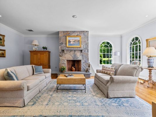 Fireplace, Interior, Living room, Recessed Lighting, Stone Walls, Wood Texture Flooring