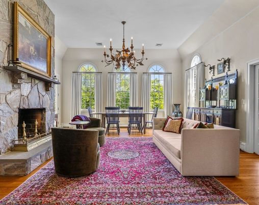 Chandelier, Dining room, Fireplace, Interior, Living room, Stone Walls, Wood Texture Flooring