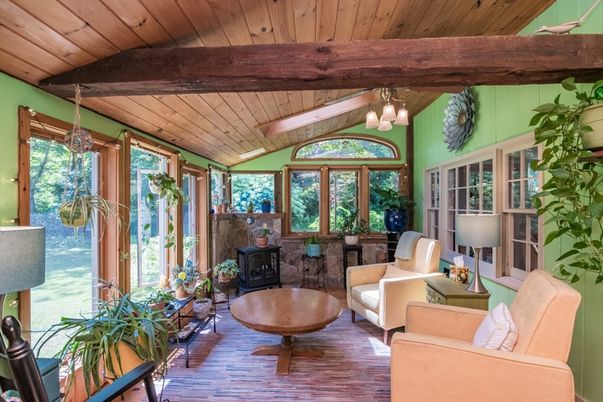 Chandelier, Fireplace, Interior, Living room, Sun Room, Wooden Beams, Wooden Ceilings, Wood Texture Flooring